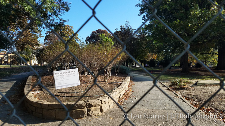 Construction fencing around Moore Square