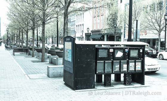 An empty newsstand on Fayetteville Street
