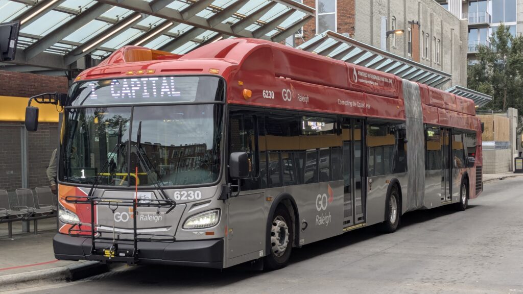Photo of articulated bus at GoRaleigh Station.