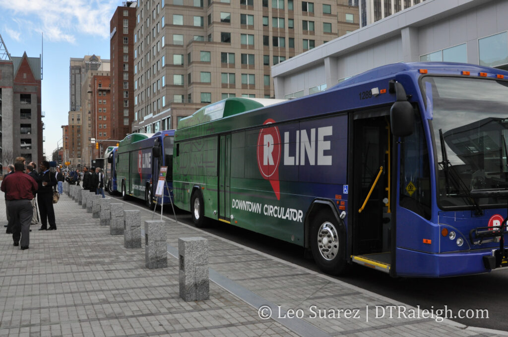 Photo of the first R-Line buses being shown off to the public and media, February 2009.
